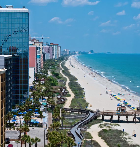Birds Eye View of Myrtle Beach, South Carolina view of mytle beach from the top of the ferris wheel, showing the pier, and hotels and condos along the beach and shoreline